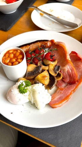 Full english breakfast with poached egg